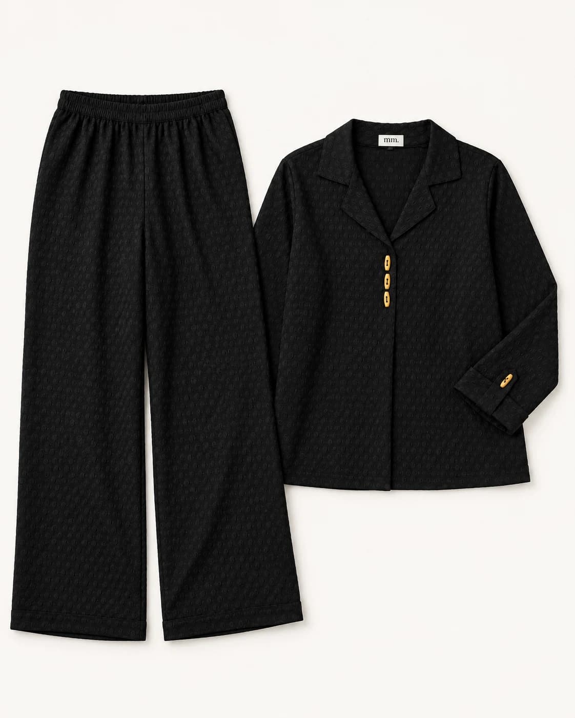 Black co-ord set flat lay